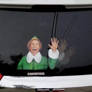 Buddy from Elf sticker with arm waving on rear windshield
