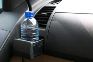 Water bottle placed on the car.