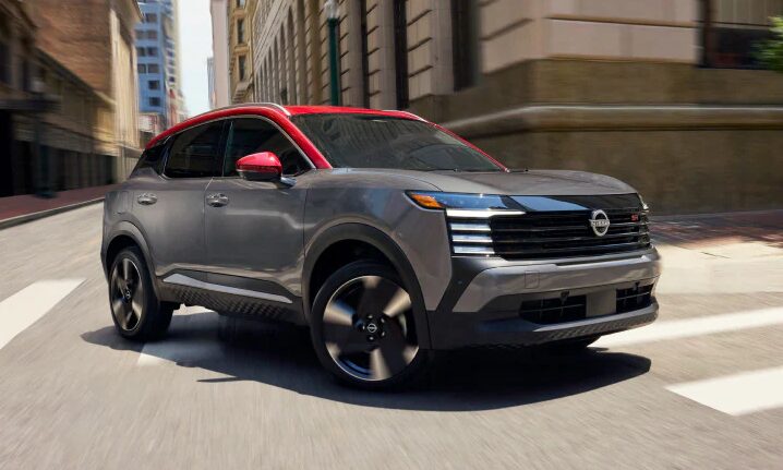 Close up of a 2025 Nissan Kicks, AWD, and two toned red and metallic gray